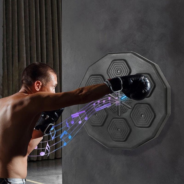 man punching bluetooth boxing trainer