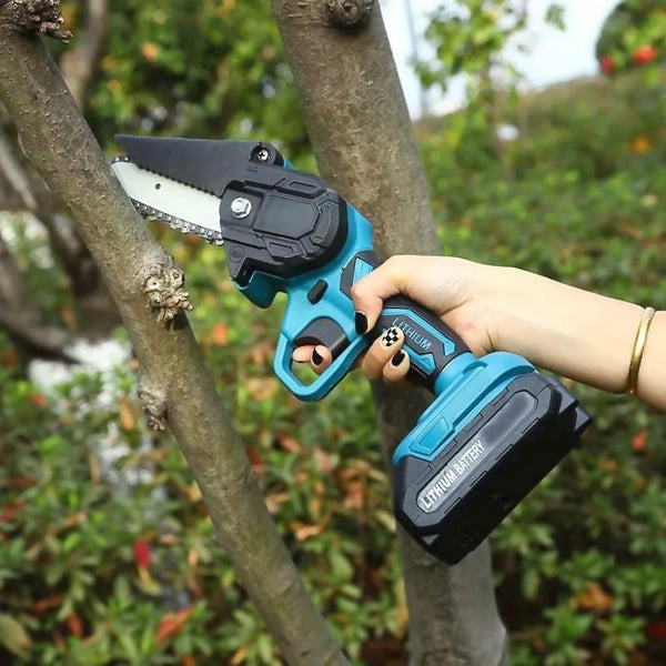 mini chainsaw cutting branch