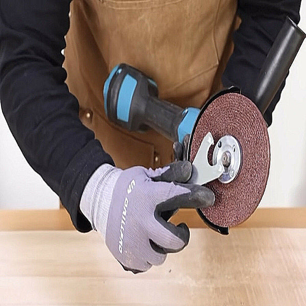 attaching a grinding wheel to grinder